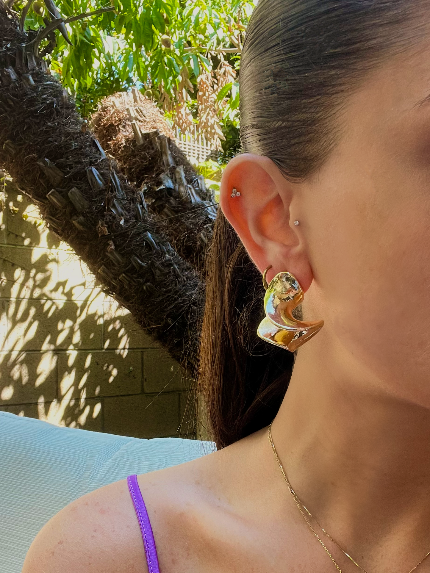 Sara’s squiggly earrings